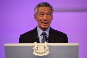 Singapore Prime Minister Lee Hsien Loong delivers his opening address at the 14TH Asia Security Summit at the International Institute for Strategic Studies (IISS) Shangri-La Dialogue 2015 in Singapore on May 29, 2015. Asian countries led by China and Japan should put World War II behind them to promote regional trust and cooperation, Singapore Prime Minster Lee Hsien Loong said on May 29. AFP PHOTO / ROSLAN RAHMAN